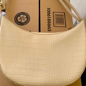 Cream moon shape hand bag